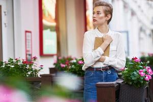 short haired woman reading walk in the fresh air Lifestyle photo