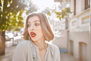 woman outdoors in park summer walk emotions photo