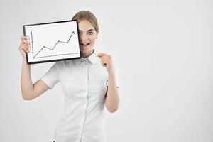 financier in a white shirt with a folder in hand isolated background photo