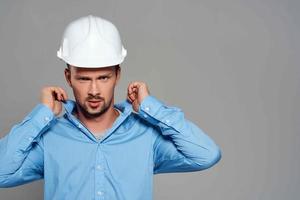 emotional man in construction helmet engineer work industry photo