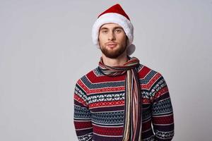 man in Christmas clothes holiday New Year Studio photo