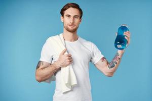 sport man in white t-shirt water bottle health workout isolated background photo