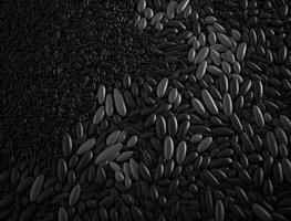 Abstract black geometric background Various rice seed shapes Flat lay created with technology photo