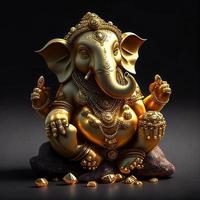 Golden ganesha statue on black background photo