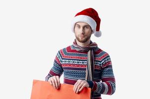 emotional man in New Year's clothes holding a banner holiday copy-space studio photo