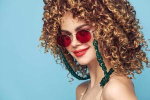 Beautiful woman curly hair smile decoration fun lifestyle bare shoulders photo