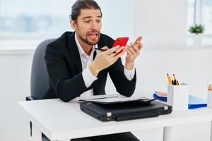 manager work emotions in front of laptop communication technology photo