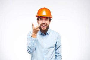 emocional trabajadores en naranja pintar la seguridad en construcción industria oficial foto