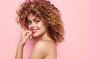 woman side view curly hair smile bright makeup Copy space photo