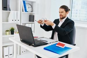 office worker at the desk documents technology photo