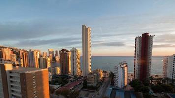 timelapse of the coast and high rise skyline of benidorm seaside resort, shot from a high vantage point, spain video