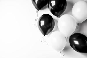 Black and white balloon on white background with copy space. photo