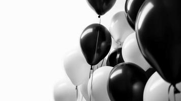 Black and white balloon on white background with copy space. photo