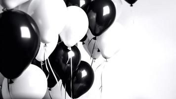 Black and white balloon on white background with copy space. photo