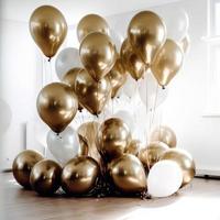 Gold and white balloon on white background with copy space. photo