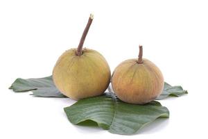 Ripe Santol, Sentul fruit or Sandoricum koetjape with leaf isolated on white background. photo