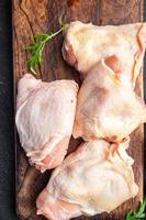 raw chicken thigh chicken legs meat meal food snack on the table copy space food background rustic top view photo