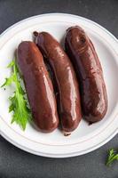 black pudding fresh bloody sausage meal food snack on the table copy space food background rustic top view photo