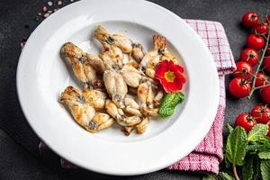 frog legs fried meat cuisine french food meal food snack on the table copy space food background rustic top view photo