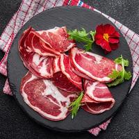 coppa cured meat sausage pork neck meal food snack on the table copy space food background rustic top view photo