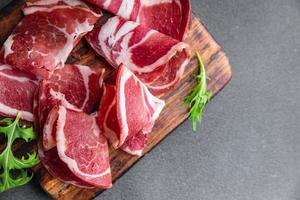 coppa cured meat sausage pork neck meal food snack on the table copy space food background rustic top view photo