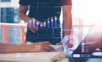 analyst discussion on data charts, Analyst working with Business Analytics and Data Management System, KPI report and metrics connected to database. Corporate strategy for finance, meeting concept photo
