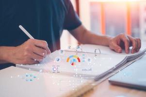 data analysis, man working on paper work and virtual chart, graph, working from home, business planning, Business Analytics and Data Management System photo
