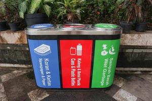 Garbage can for separate waste collection, environmental education photo