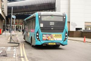 Low Angle View of British Road and Traffic at Luton Town of England UK. The Image Was Captured at Central Luton  City During a Cold and Cloudy Evening of 01-April-2023 photo