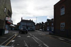 Low Angle View of British Road and Traffic at Luton Town of England UK. The Image Was Captured at Central Luton  City During a Cold and Cloudy Evening of 24-March-2023 photo