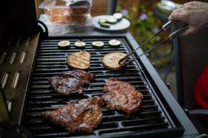 pork neck grilled on a gas grill. Closeup photo