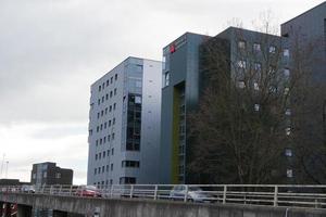 Low Angle View of Downtown City Center of British City London Luton Town of England UK. The Image Was Captured at Central Luton  City During a Cold and Cloudy Evening of 26-March-2023 photo