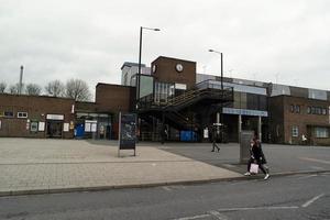 Low Angle View of Luton Central Bus Station at Main Railway Station of Downtown Luton City of England Great Britain. The Image Was Captured on 01-April-2023 on Cloudy and Cold Evening photo
