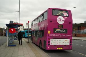 Low Angle View of Luton Central Bus Station at Main Railway Station of Downtown Luton City of England Great Britain. The Image Was Captured on 01-April-2023 on Cloudy and Cold Evening photo