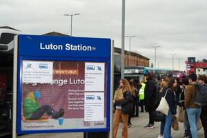 Low Angle View of Luton Central Bus Station at Main Railway Station of Downtown Luton City of England Great Britain. The Image Was Captured on 01-April-2023 on Cloudy and Cold Evening photo