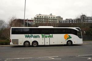 Low Angle View of Luton Central Bus Station at Main Railway Station of Downtown Luton City of England Great Britain. The Image Was Captured on 01-April-2023 on Cloudy and Cold Evening photo