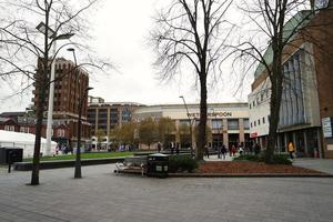 Low Angle View of Downtown City Center of British City London Luton Town of England UK. The Image Was Captured at Central Luton  City During a Cold and Cloudy Evening of 01-April-2023 photo