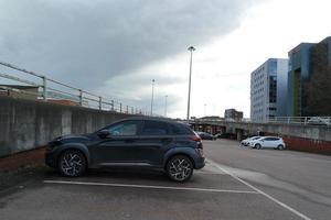 Low Angle View of British Road and Traffic at Luton Town of England UK. The Image Was Captured at Central Luton  City During a Cold and Cloudy Evening of 24-March-2023 photo