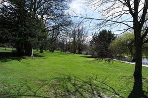 Low Angle View of Local Public Park. The Image Was Captured at Wardown Public Park of Luton Town of England UK During a Cold and Cloudy Evening of 25-March-2023 photo