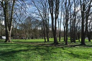 Low Angle View of Local Public Park. The Image Was Captured at Wardown Public Park of Luton Town of England UK During a Cold and Cloudy Evening of 25-March-2023 photo