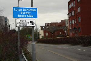 Low Angle View of British Road and Traffic at Luton Town of England UK. The Image Was Captured at Central Luton  City During a Cold and Cloudy Evening of 01-April-2023 photo