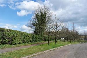 Low Angle View of Local Public Park and Beautiful Trees a Clear and Cold Day of 22-March-2023 at Luton Town of England UK. photo