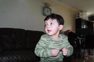 Cute Asian Pakistani Baby, Ahmed Mustafain Haider is Posing at Home. Originally he is from Pakistan but Live at Luton England UK. Image was Captured on 25-March-2023 photo