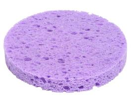 Round purple makeup sponge on a white isolated background, photo