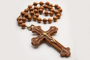 wooden cross to wear around the neck. christian symbol. photo