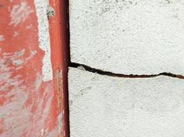 Cracked concrete wall, longitudinal, low standard construction photo