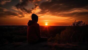 Moment of someone watching a beautiful summer sunset. photo