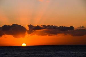 Sunset over the sea photo