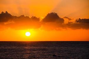 Sunset over the sea photo