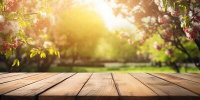 Empty wooden table in spring garden blurred background, Free space for product display. photo